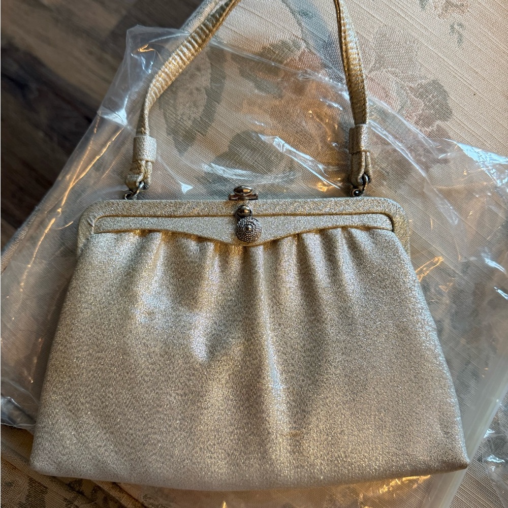 After five vintage silver purse